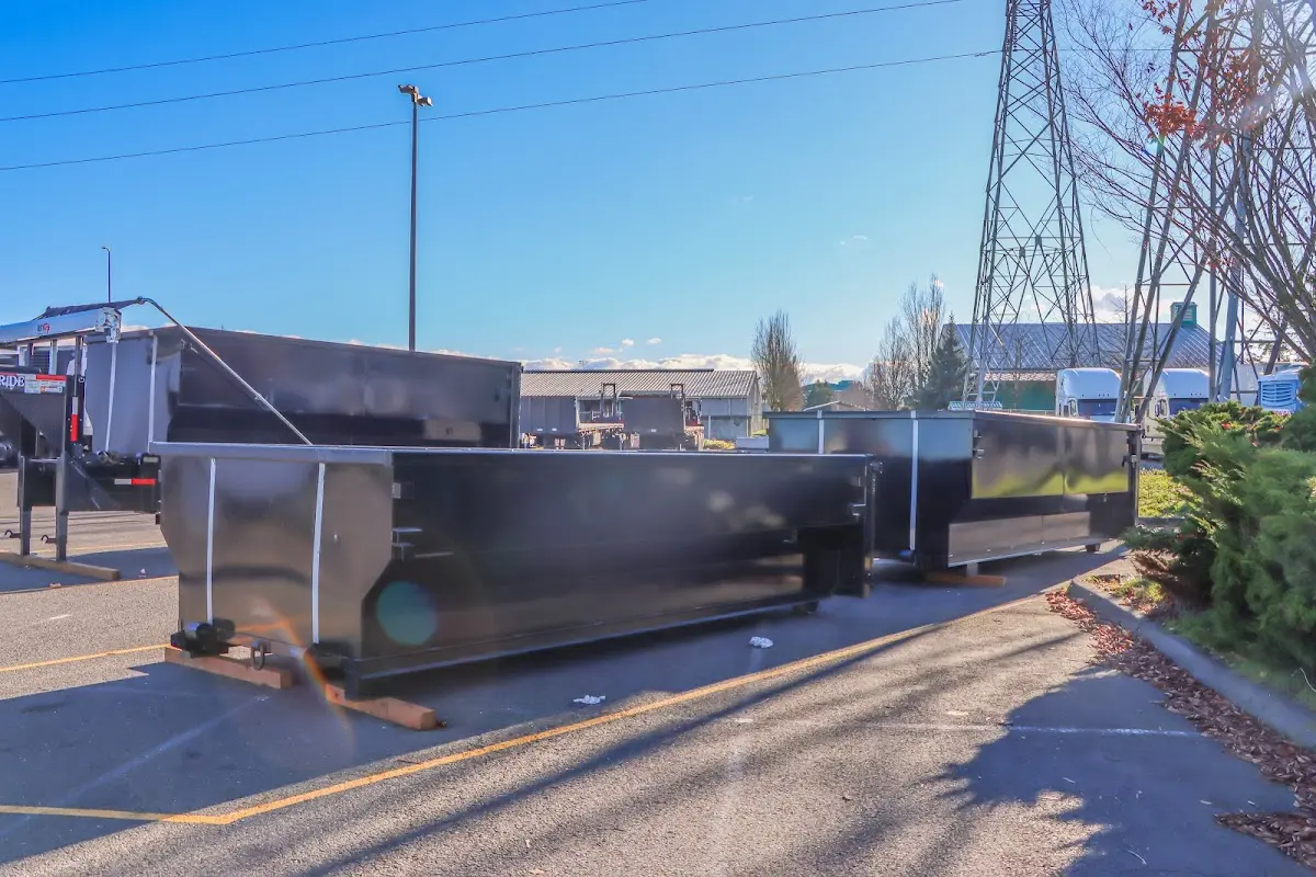 Roll-off dumpster ready for waste disposal at job site for 4 Yard Dumpster Rental in Guilford